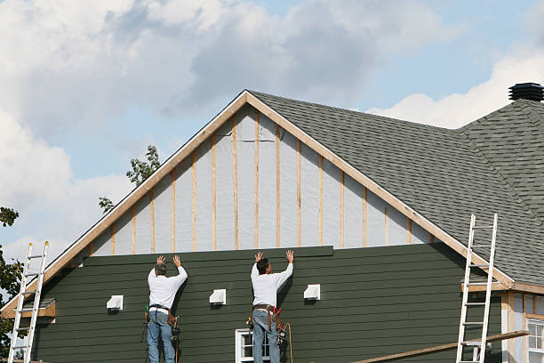Professional Siding Installation technician working in Jericho, NY